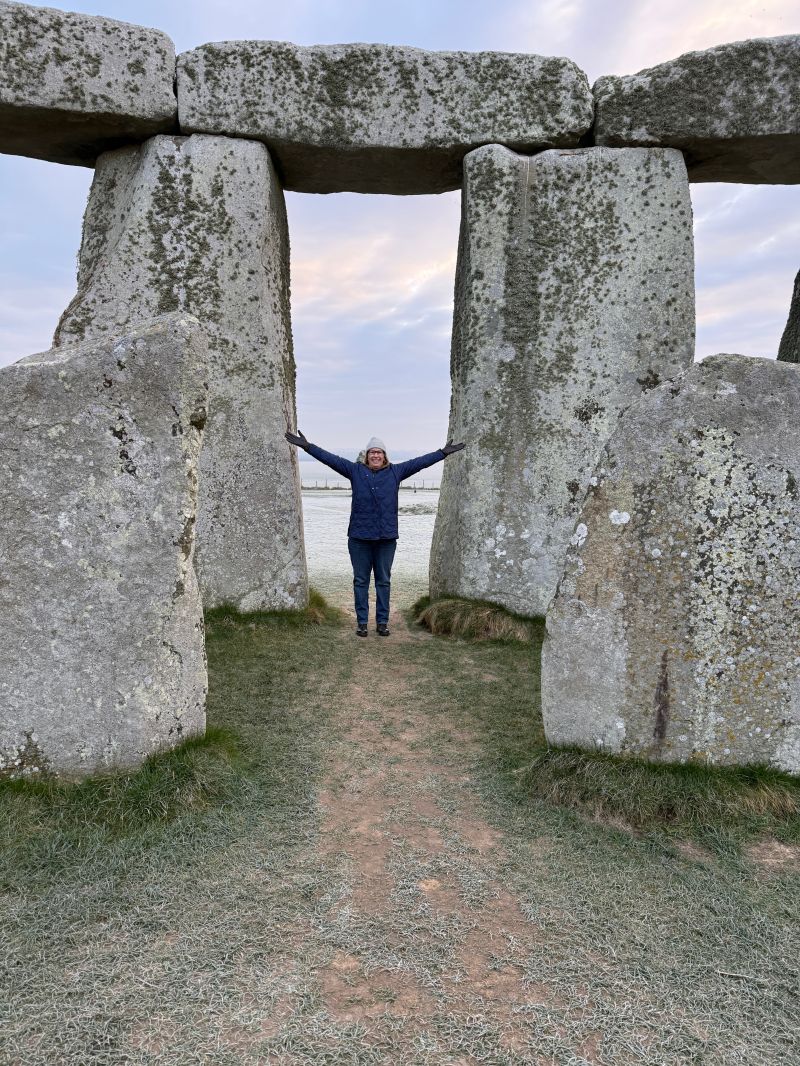Kelley standing at Stonehenge