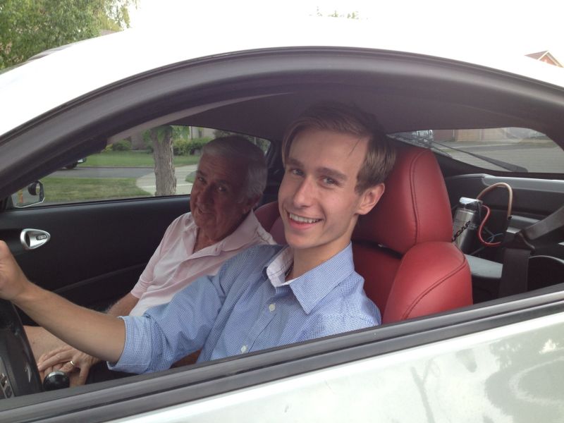 Dad and Clayton in his sports car