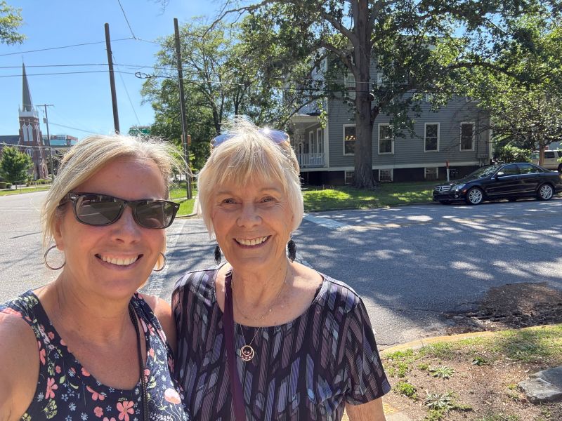 Kelley and Mom standing outside the lawyer's office