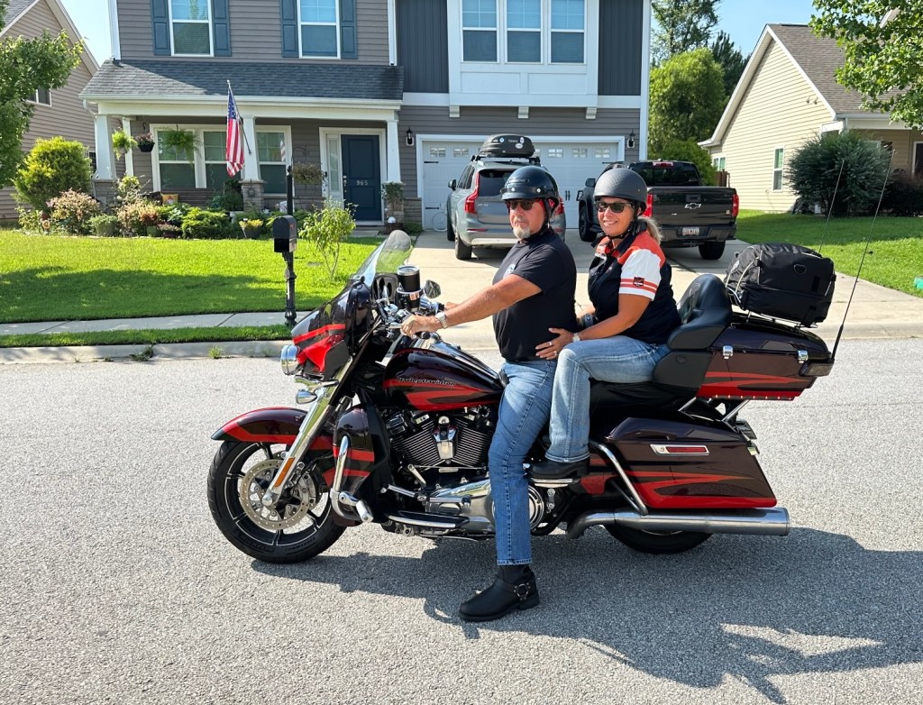 Les and Kelley on their motorcycle